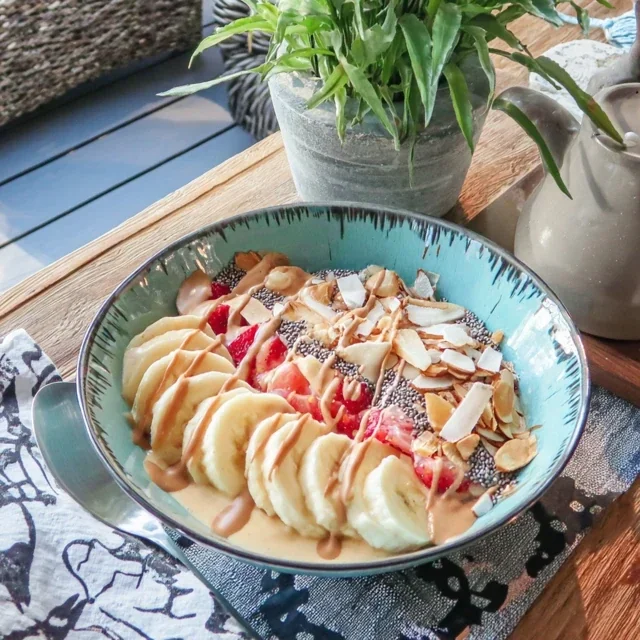 Delicious Tropical Mango and Banana Smoothie Bowl with Chia Seeds for a Healthy Start to Your Day