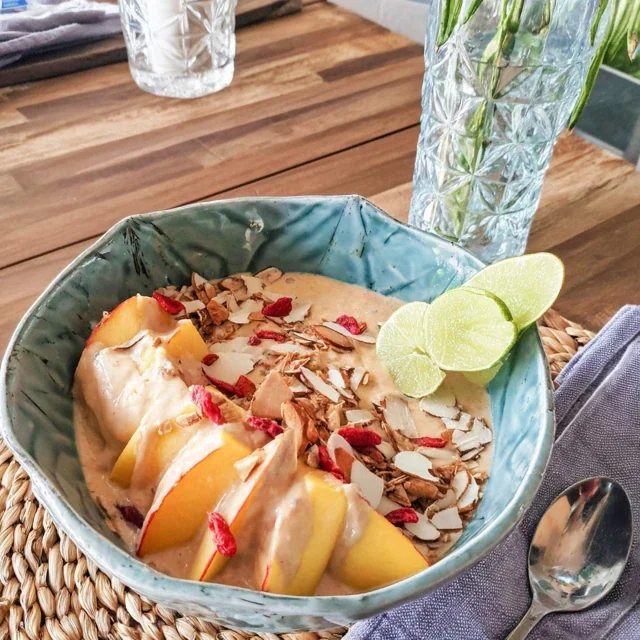 Delicious Tropical Mango and Banana Smoothie Bowl with Chia Seeds for a Healthy Start to Your Day